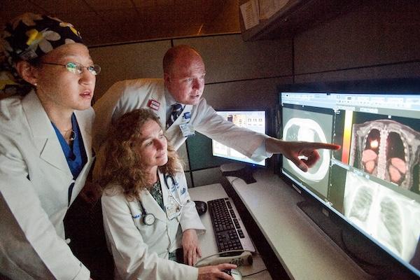 Doctors looking at imaging