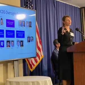 Nicoleta Economou, PhD, at a podium